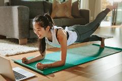 GettyImages-1098382614 working-out-at-home-using-a-computer